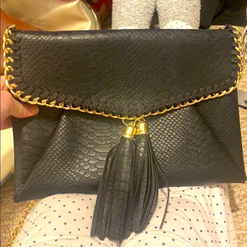 The Perfect Black Clutch With Gold Chain Strap